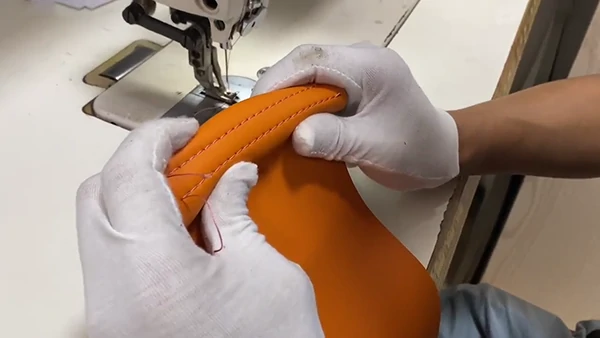 sewing needle hole resistance test for synthetic leather
