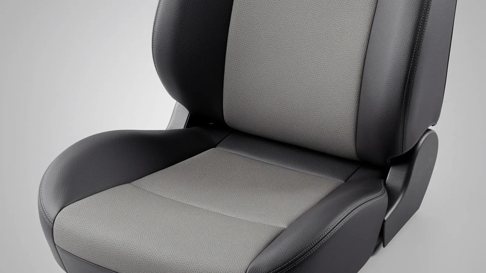 Grey seat centre panels and dark side bolsters with stitched joins